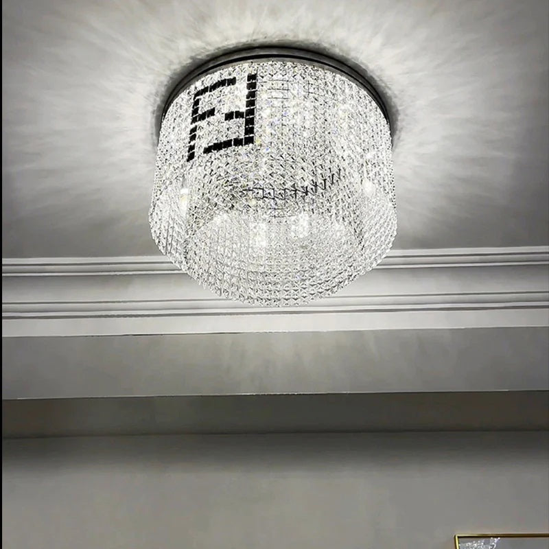The chandelier's crystal strings are exquisitely crafted, producing a sparkling and shimmering effect that adds an element of luxury and sophistication to any space. The Fendi Crystal Chandelier is perfect for adding a touch of glamour and elegance to large rooms, entryways, and formal dining spaces. 