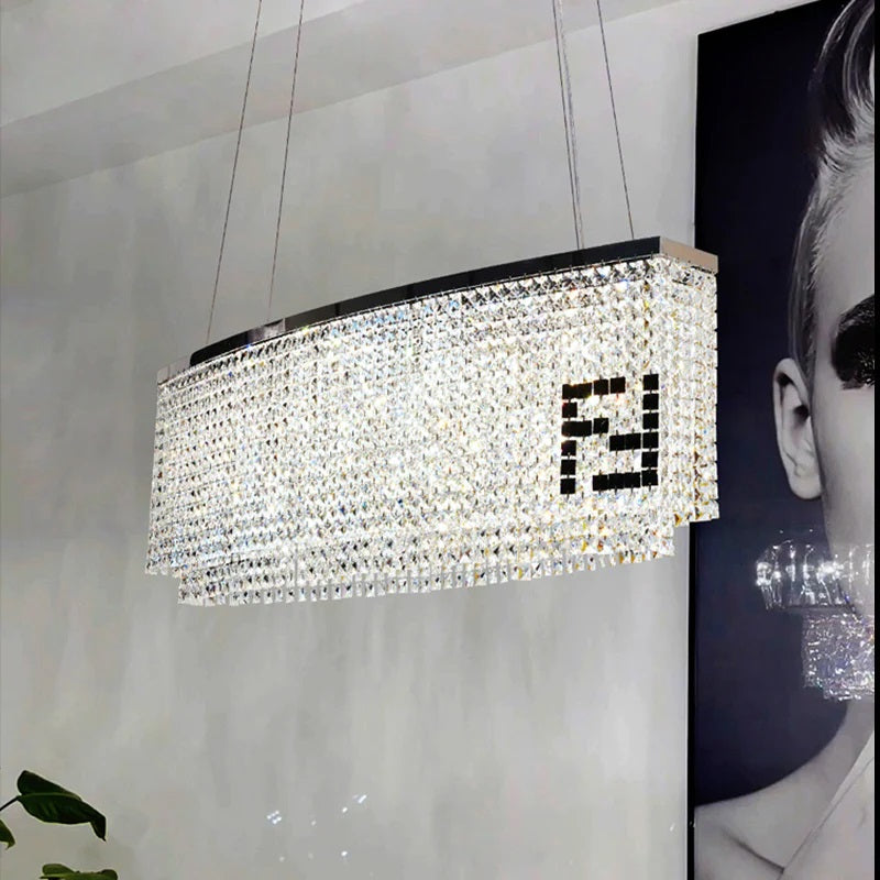 The chandelier's crystal strings are exquisitely crafted, producing a sparkling and shimmering effect that adds an element of luxury and sophistication to any space. The Fendi Crystal Chandelier is perfect for adding a touch of glamour and elegance to large rooms, entryways, and formal dining spaces. 