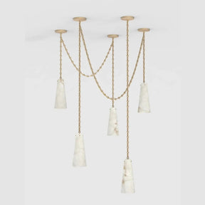 The alabaster shade, with its pearl-like texture, adds a touch of elegance and sophistication to the overall aesthetic. The combination of different quantities of alabaster creates a unique and eye-catching effect, with the pure and natural beauty of the alabaster shining through. As a focal point in your space, this alabaster light is sure to captivate attention and add a radiant glow to any room.