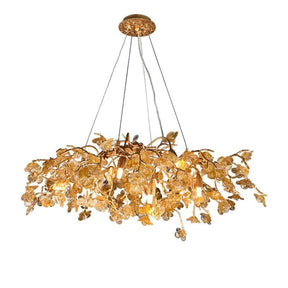 Rita Flower Brass Branch Chandelier is made of Brass and High-quality glass. The small glass pieces are formed to be the flower shape. Body frame is hand-forged into beautifully intricate tree branches.  Suitable for every space in your room.