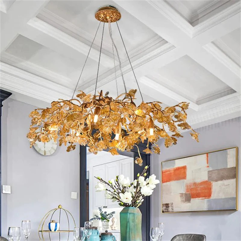 Rita Flower Brass Branch Chandelier is made of Brass and High-quality glass. The small glass pieces are formed to be the flower shape. Body frame is hand-forged into beautifully intricate tree branches.  Suitable for every space in your room.