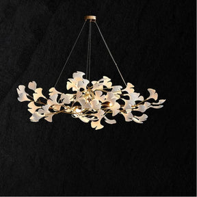 The ceramic petals of the chandelier are crafted with fine workmanship, with each petal unfolding outward in a lifelike manner, creating a sense of dynamic movement and capturing the beauty of nature. The intricate details of the ceramic petals reflect the perfect fusion of lighting design and botanical inspiration, adding a touch of natural elegance to any space.