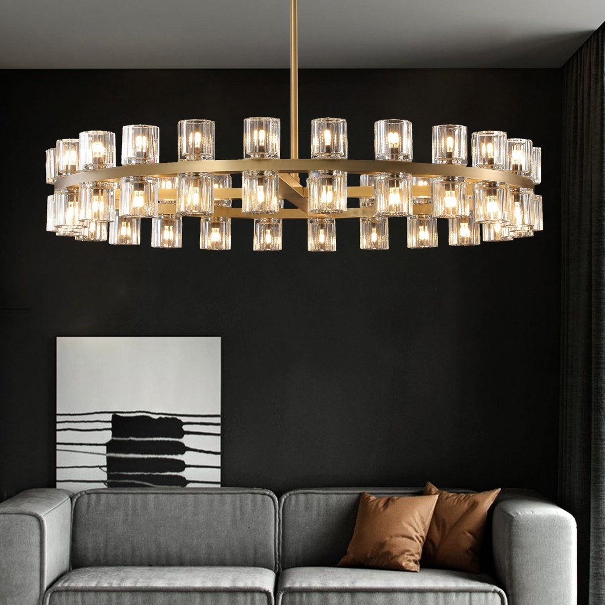 The rhythmic design of this chandelier collection is inspired by the shape and scale of industrial gears, where spokes are interlaced with negative space to interlock with other gears. Here, the spokes are hexagonal in form, juxtaposed with a circular interior, crafted from crystal glass, running along a simple, sturdy metal frame. The light shines through the glass as if it were a candle.