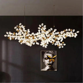 The frame of the branches is handmade and the cups are made of balls in the shape of grapes in milk white and gold. It is an elegant and charming lamp for banquets, living room foyers.