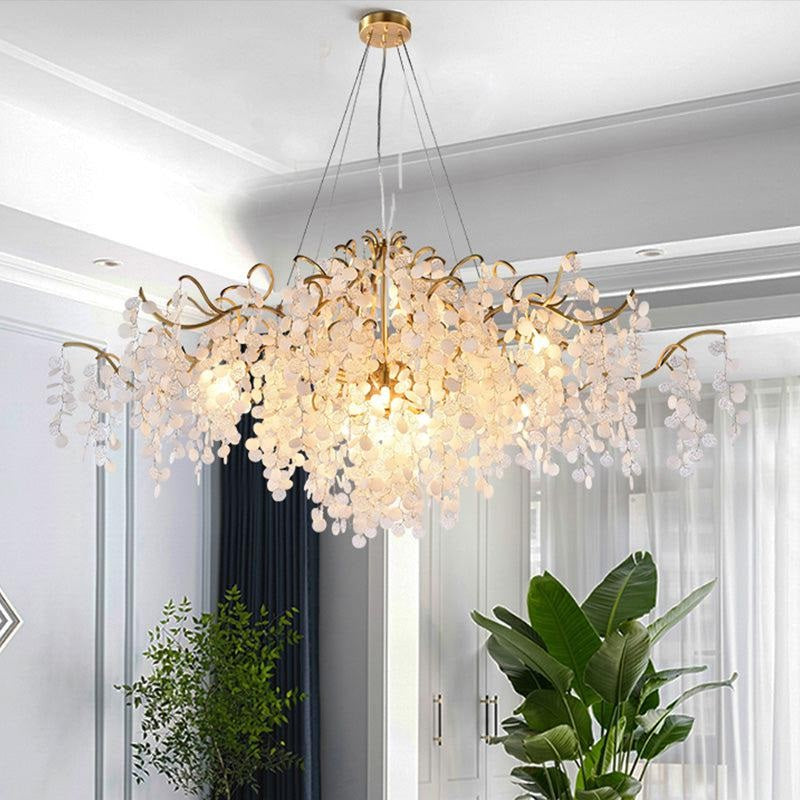 Wisam Creative Oval Tree Branch Chandelier a luxurious chandelier made of brass and glass discs. Inspired by organic nature, this chandelier is suitable for use in the living room or dining room. It is an elegant, attractive and looks like a blossoming tree, making the home fresh and delightful like nature.