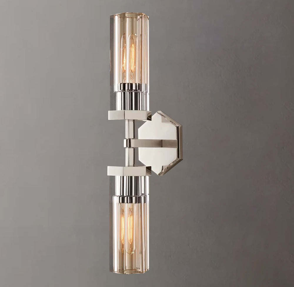 This lamp is two column-shaped golden lamps. It has a simple shape but can create a very warm lighting effect.